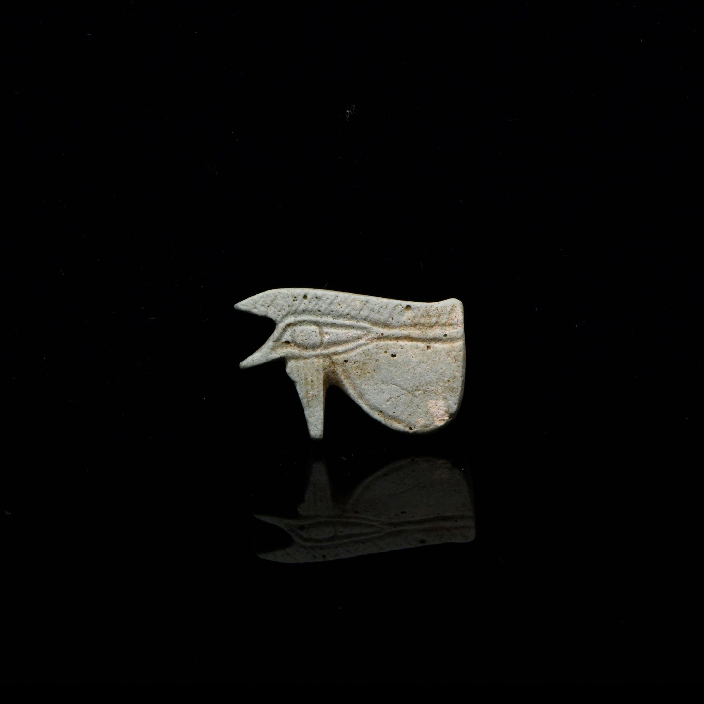 An Egyptian Faience Wedjet Eye Amulet, Late Period, ca. 664 - 332 BCE