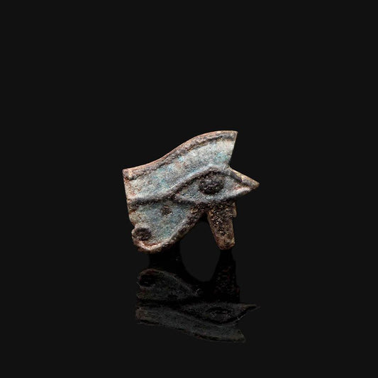 An Egyptian Faience Wedjet Eye Amulet,  Late Period, ca. 664 - 332 BCE