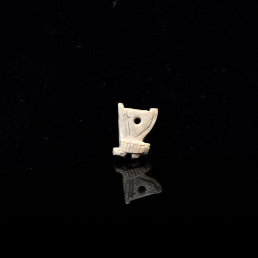 An Egyptian Bone 'Red Crown' Amulet, Late Period, ca. 664 - 332 BCE