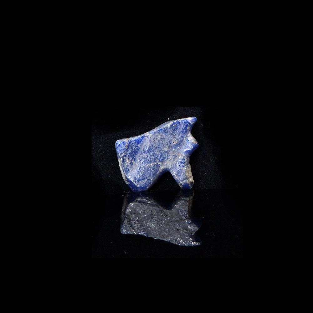 An Egyptian Glass Wedjet Eye Amulet, Late Period, ca. 664 - 332 BCE