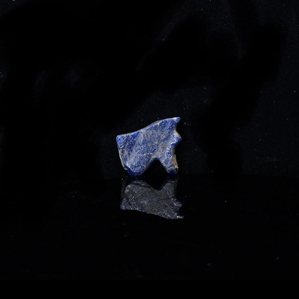 An Egyptian Glass Wedjet Eye Amulet, Late Period, ca. 664 - 332 BCE