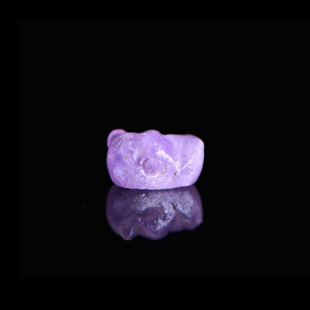 An Egyptian Amethyst Hippopotamus Head Amulet, Middle Kingdom, ca. 2017 - 1730 BCE