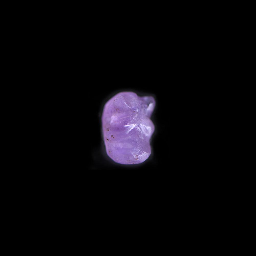 An Egyptian Amethyst Hippopotamus Head Amulet, Middle Kingdom, ca. 2017 - 1730 BCE