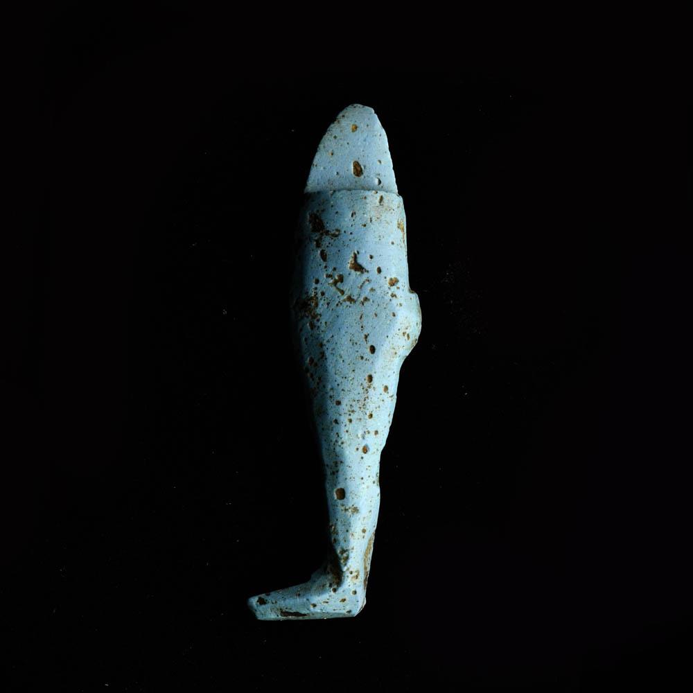 An Egyptian Blue Glass Leg Inlay, Late Period, ca. 664 - 332 BCE
