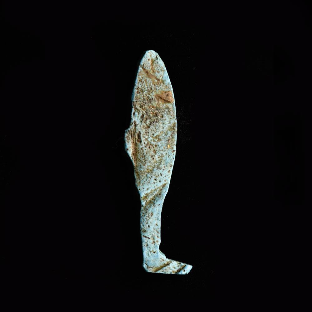 An Egyptian Blue Glass Leg Inlay, Late Period, ca. 664 - 332 BCE