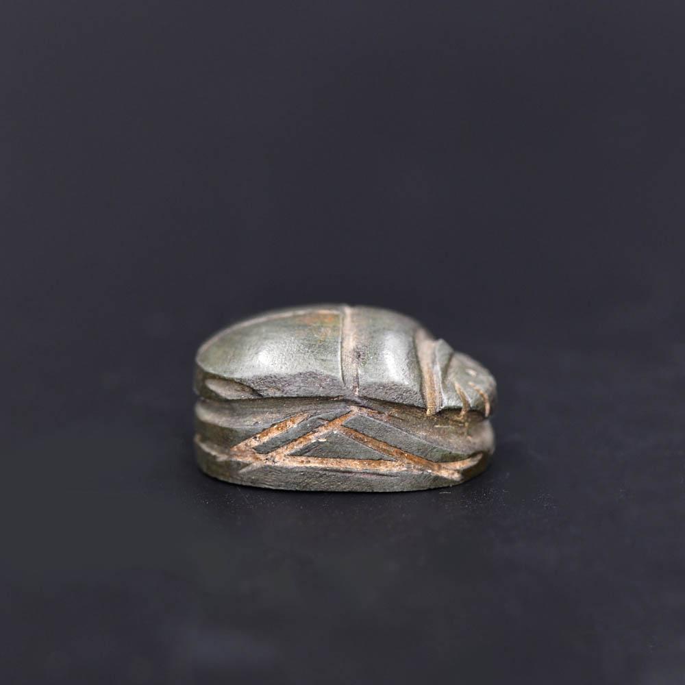 An Egyptian Green stone Heart Scarab, Late Period, ca 664 - 332 BCE