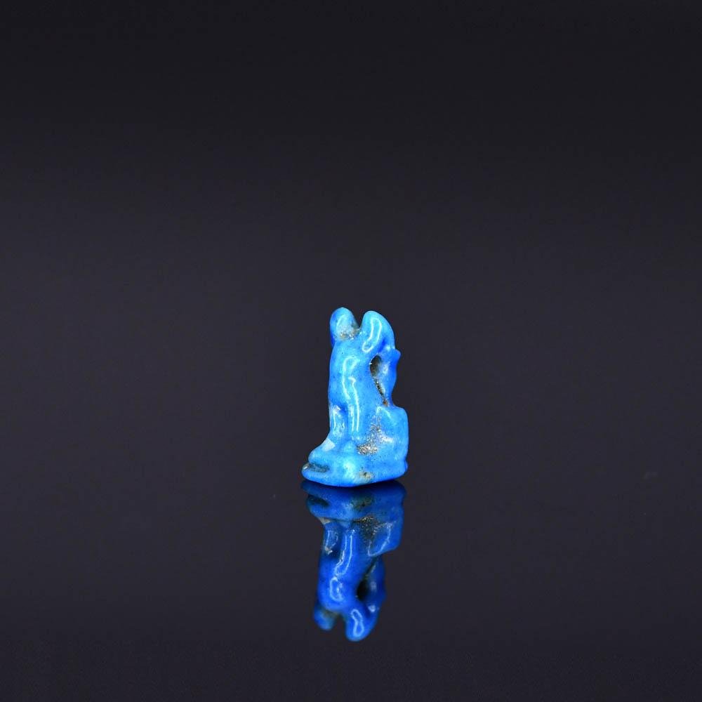 A tiny Egyptian Blue Faience Cat Amulet, Late Period, ca. 664 - 332 BCE