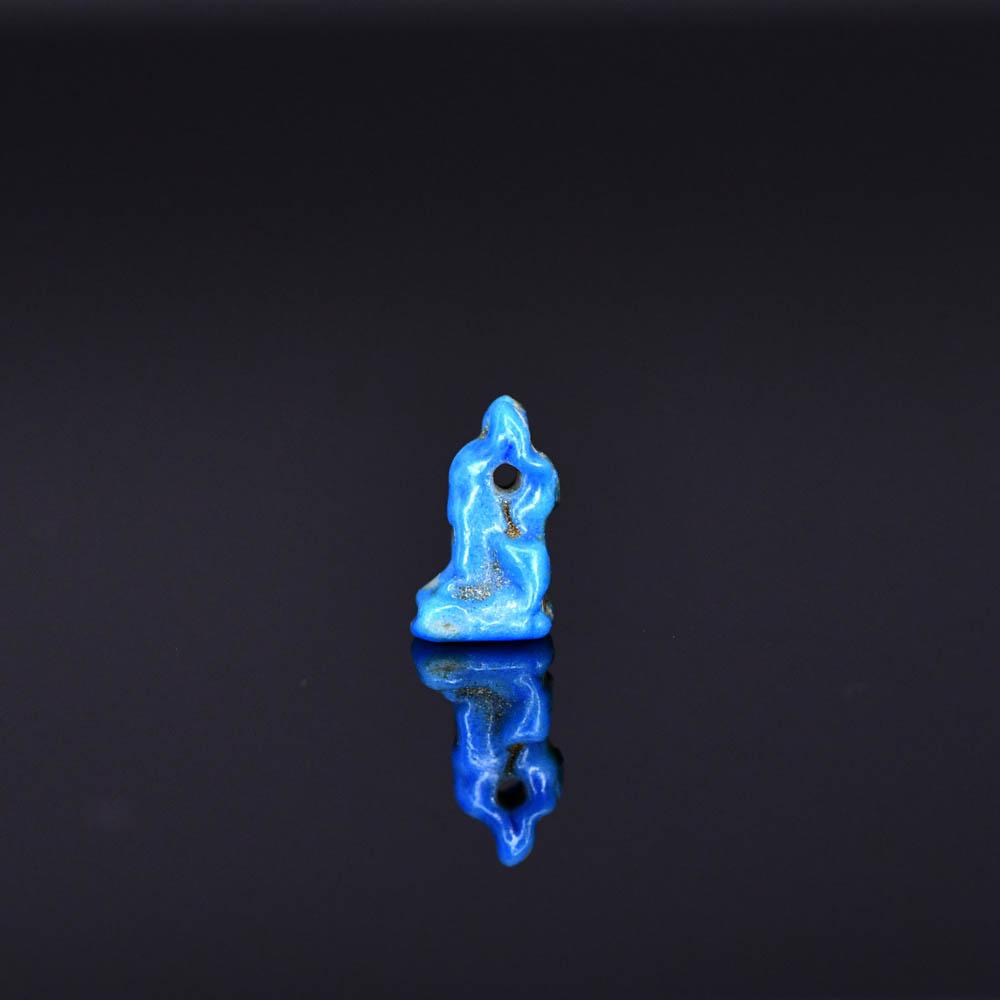 A tiny Egyptian Blue Faience Cat Amulet, Late Period, ca. 664 - 332 BCE