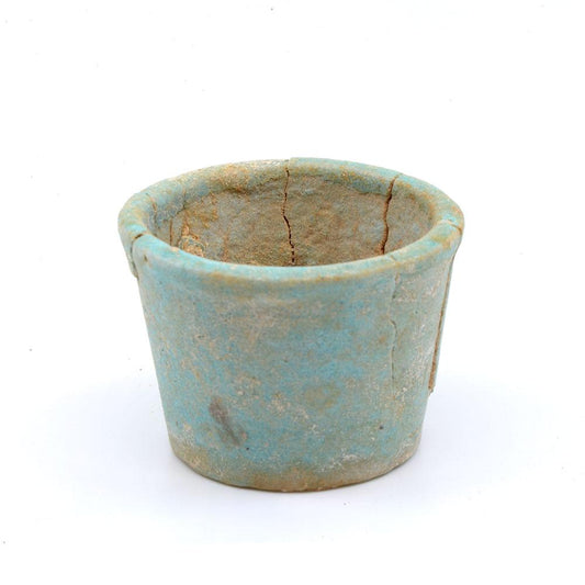 An Egyptian faience offering cup with contents, 26th Dynasty, ca. 664 - 525 BCE