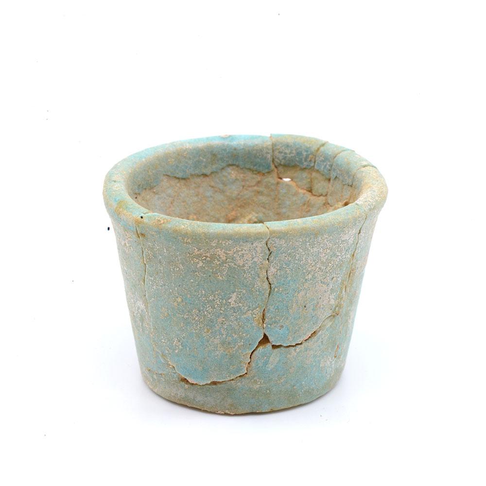 An Egyptian faience offering cup with contents, 26th Dynasty, ca. 664 - 525 BCE