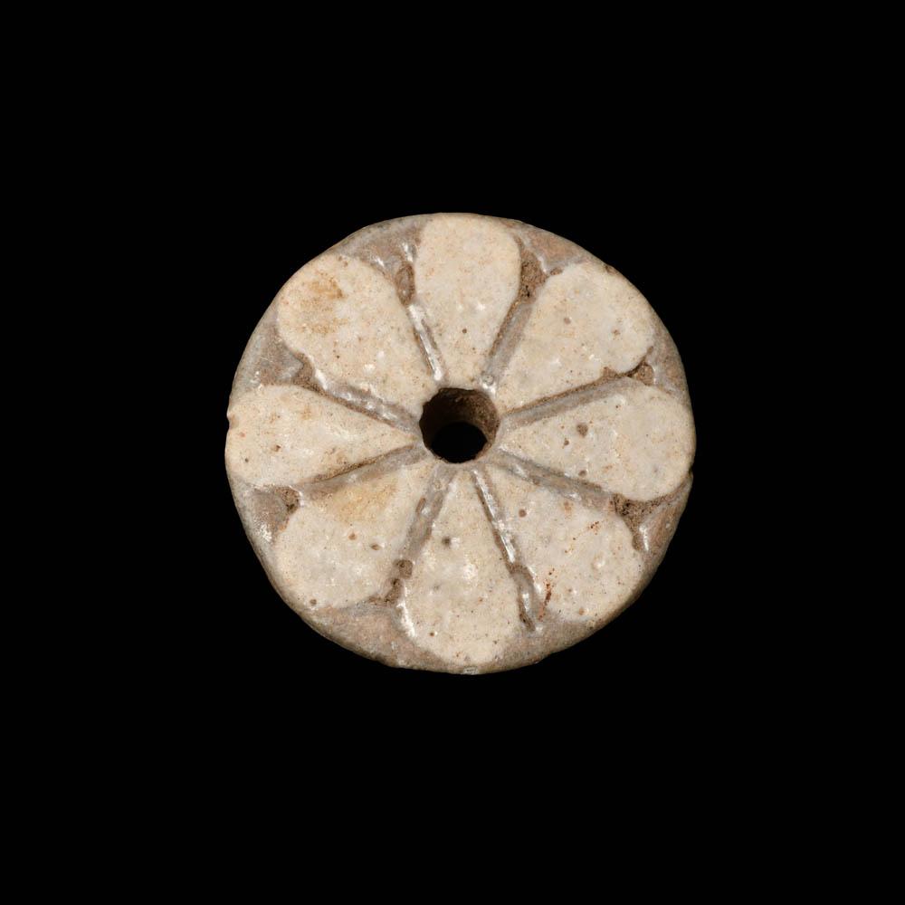 A Royal Egyptian Faience Floral Rosette, New Kingdom, ca. 1295 - 1190 BCE