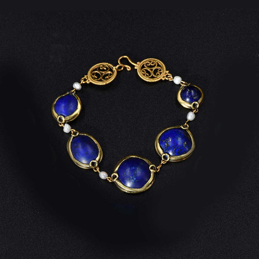 A Victorian Bracelet set with five ancient Egyptian Lapis Lazuli Scaraboids, 18th Dynasty, ca 1550 - 1295 BCE