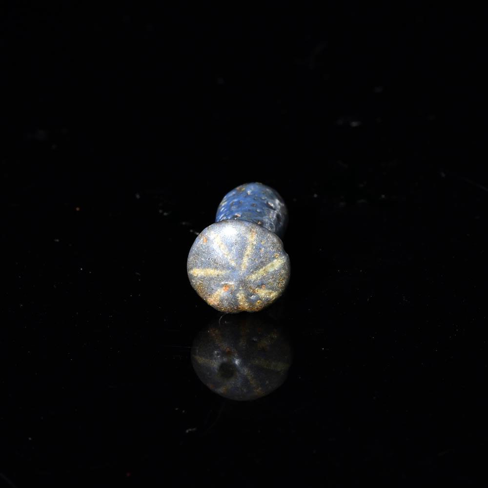 An Egyptian Faience Ear Stud, Amarna Period, ca. 1353-1336 BCE