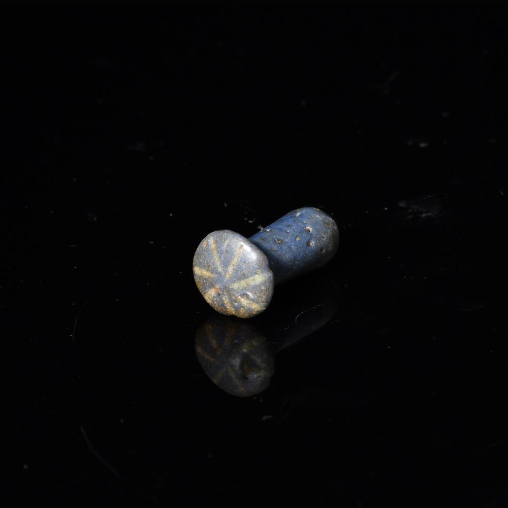 An Egyptian Faience Ear Stud, Amarna Period, ca. 1353-1336 BCE
