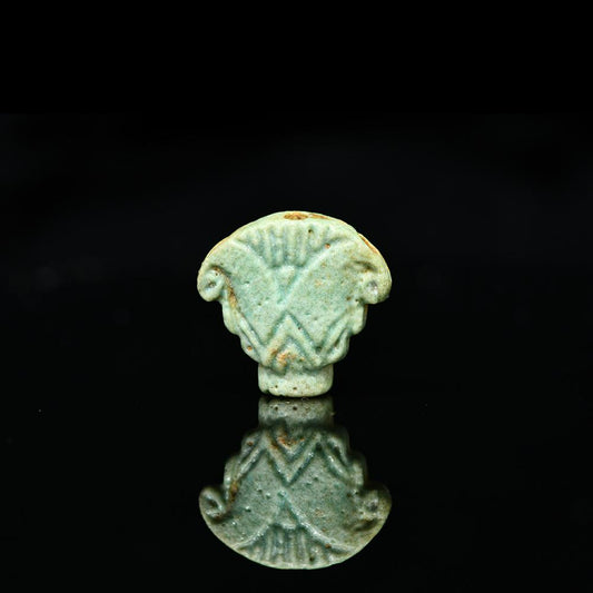 An Egyptian Faience Lotus Terminal, Late Period, ca. 664 - 332 BCE