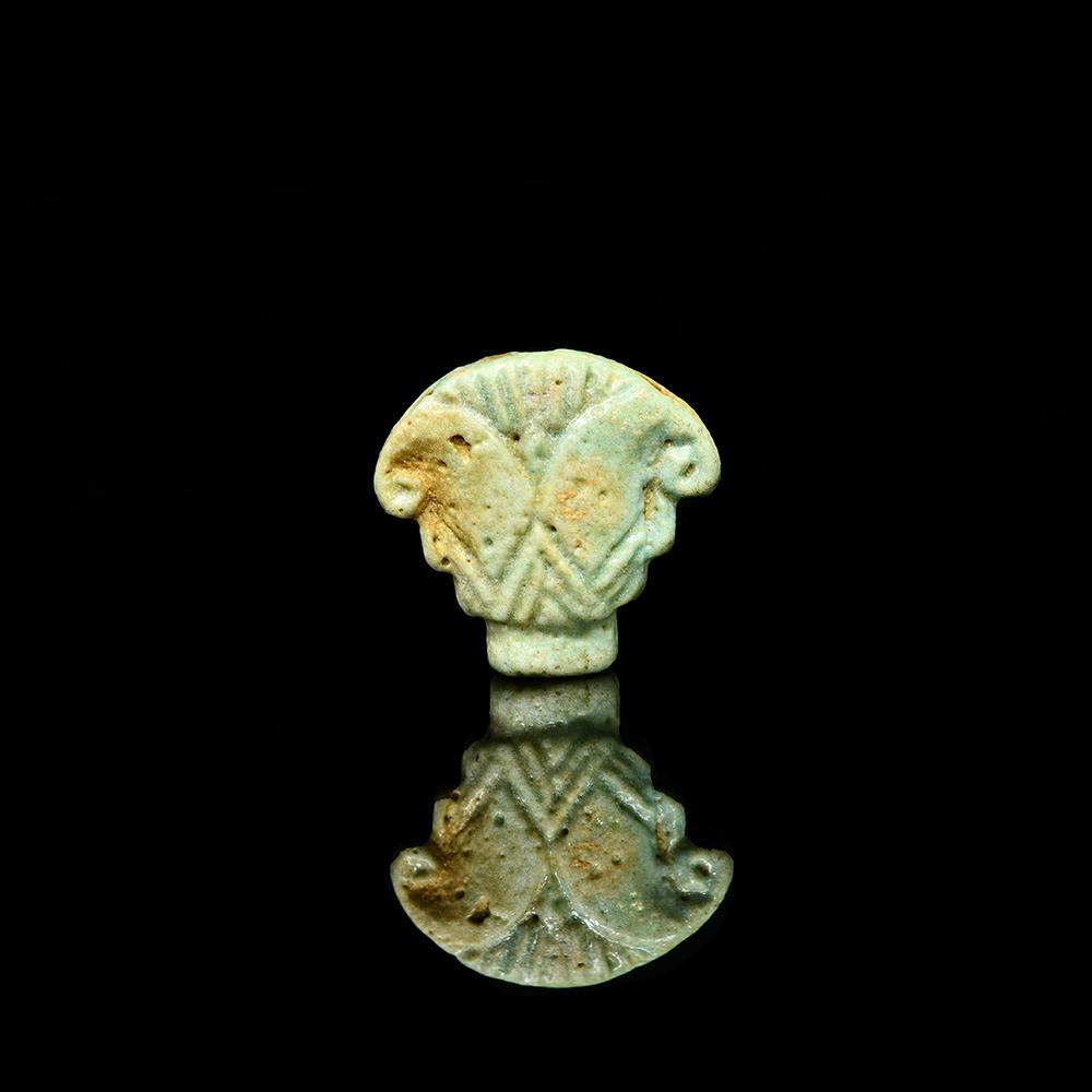An Egyptian Faience Lotus Terminal, Late Period, ca. 664 - 332 BCE
