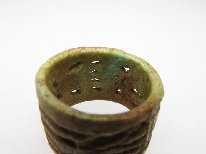 An Egyptian Faience Openwork Ring, 21st Dynasty, ca. 1069-945 BCE