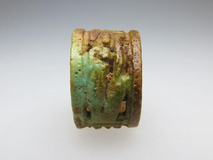An Egyptian Faience Openwork Ring, 21st Dynasty, ca. 1069-945 BCE