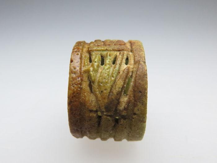 An Egyptian Faience Openwork Ring, 21st Dynasty, ca. 1069-945 BCE