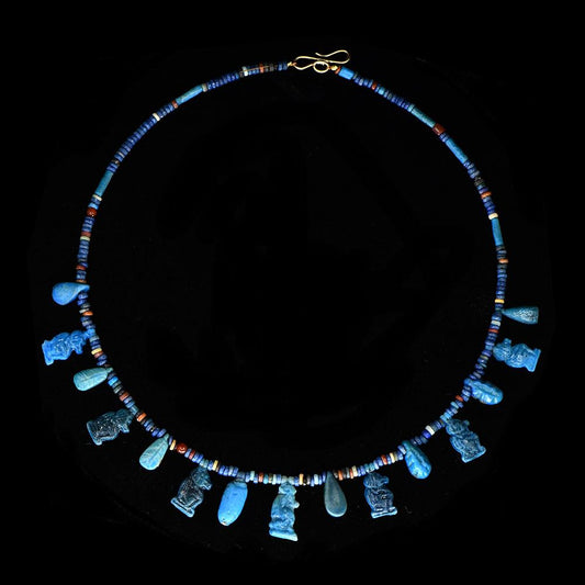 An Egyptian Faience Bead and Amulet Necklace, 18th Dynasty, ca. 1550 - 1295 BCE