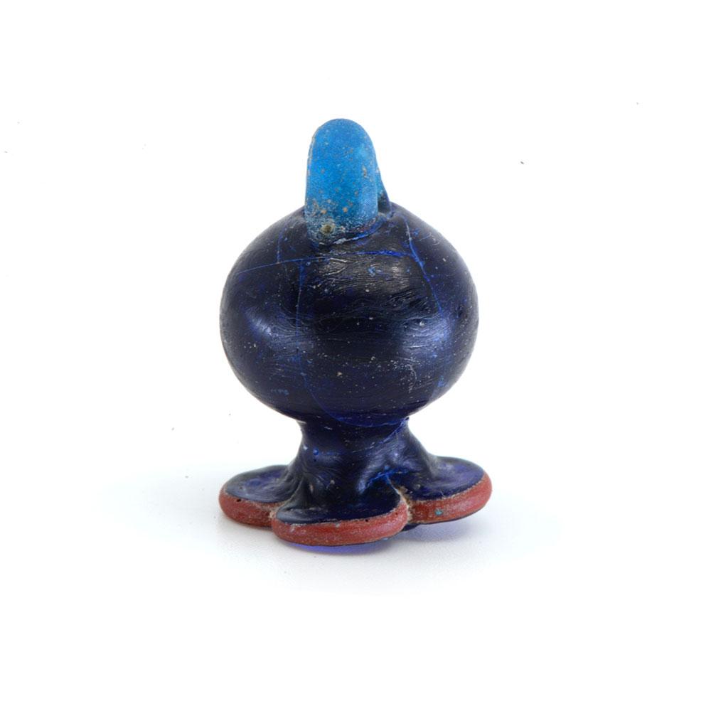 A rare Amarna Glass Pomegranate Pendant, New Kingdom, ca. 1353 - 1336 BCE