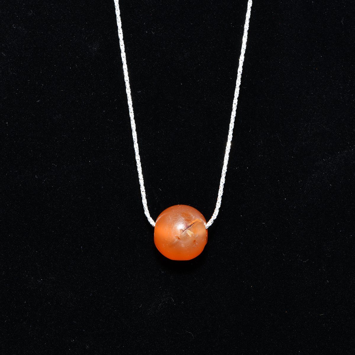 An Egyptian Carnelian Bead set as a pendant, Middle Kingdom, ca. 2017 - 1750 BCE