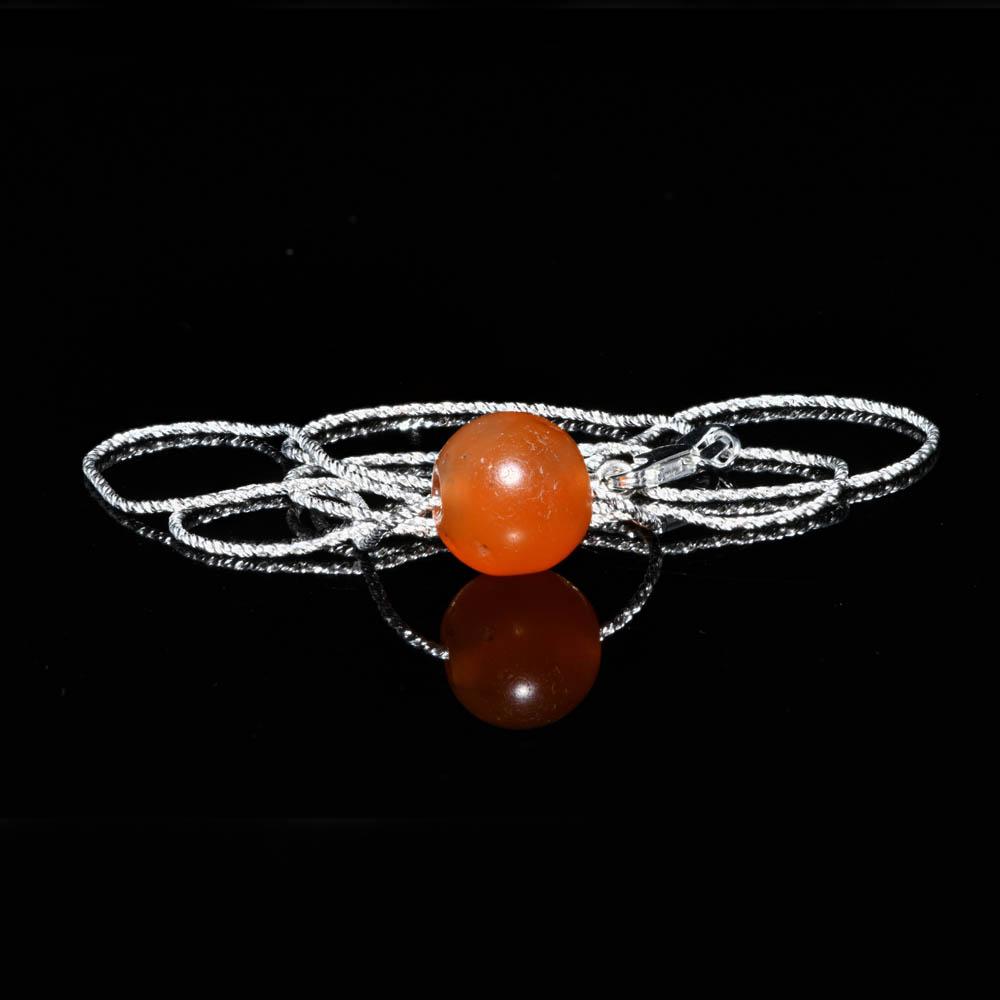An Egyptian Carnelian Bead set as a pendant, Middle Kingdom, ca. 2017 - 1750 BCE