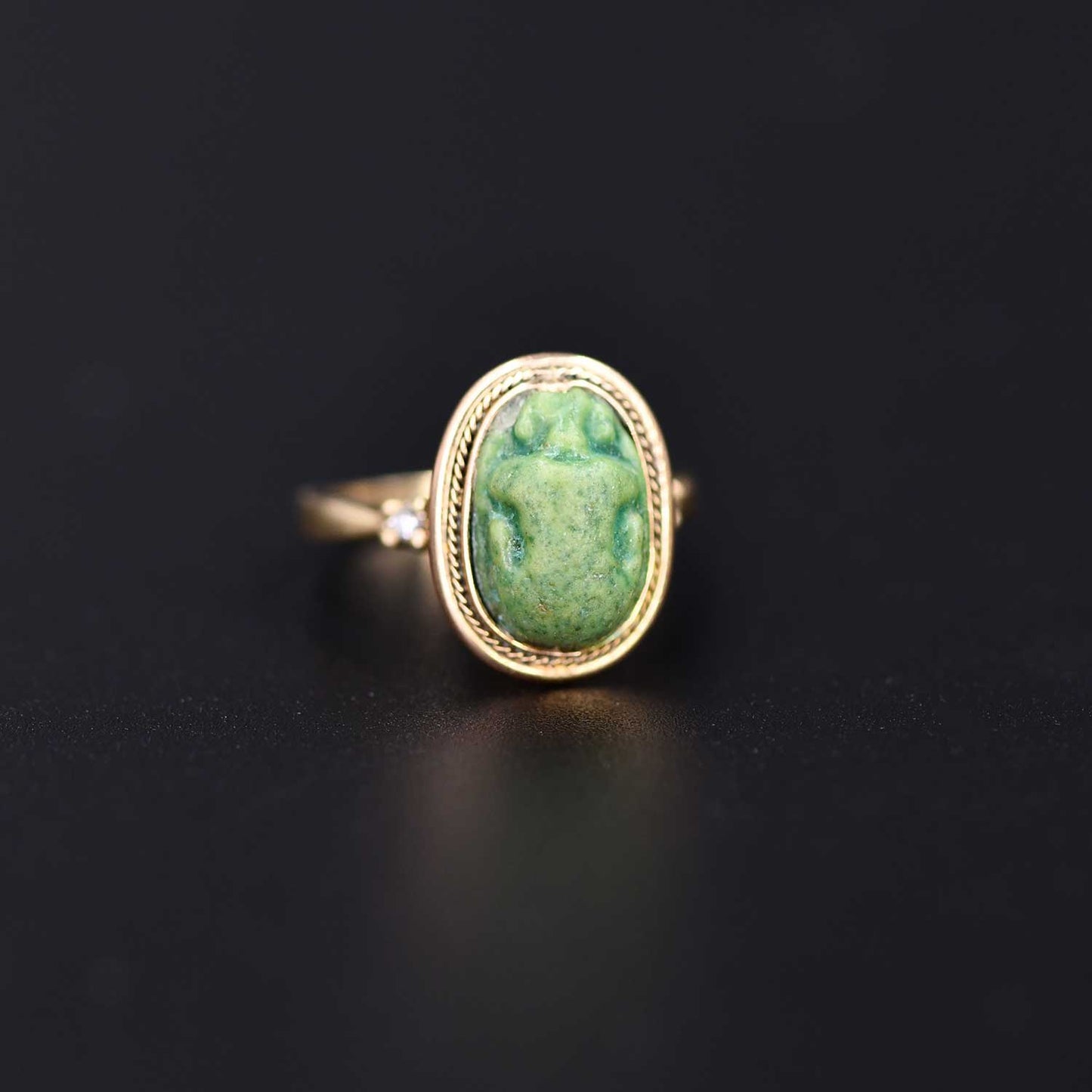 An Egyptian Green Glazed Faience Scarab, Amarna Period, ca. 1353 - 1336 BCE