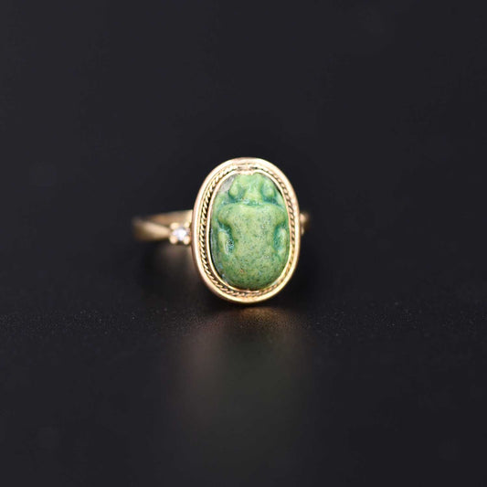 An Egyptian Green Glazed Faience Scarab, Amarna Period, ca. 1353 - 1336 BCE