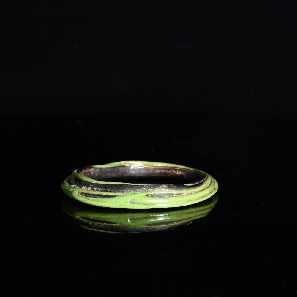 A Romano-Egyptian Green Glass Bangle, Roman Period, ca. 1st - 3rd century CE