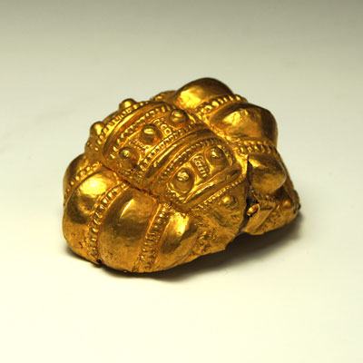 An Egyptian stucco and gold earring, Ptolemaic Period, ca 332 - 30 BCE