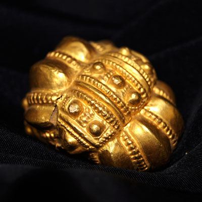 An Egyptian stucco and gold earring, Ptolemaic Period, ca 332 - 30 BCE