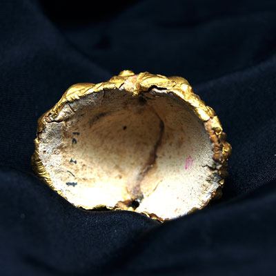 An Egyptian stucco and gold earring, Ptolemaic Period, ca 332 - 30 BCE