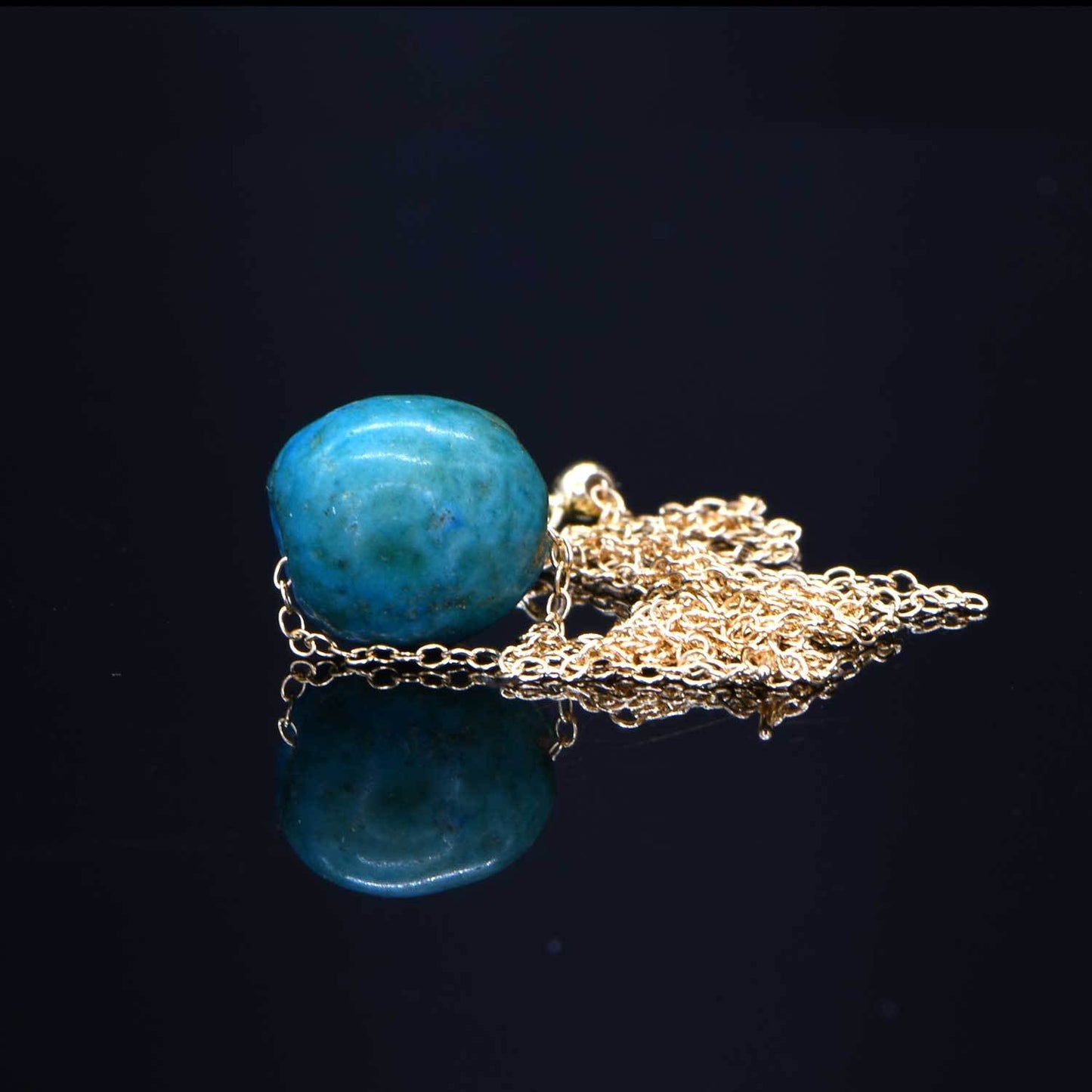 An Egyptian Faience Ball Bead Pendant, Middle Kingdom, ca. 2141 - 2122 BCE