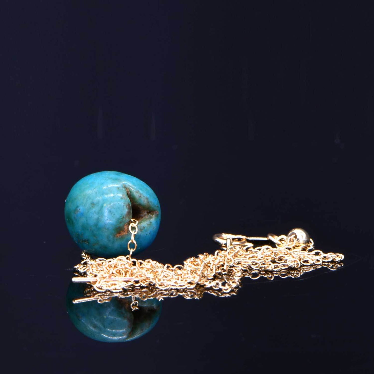 An Egyptian Faience Ball Bead Pendant, Middle Kingdom, ca. 2141 - 2122 BCE