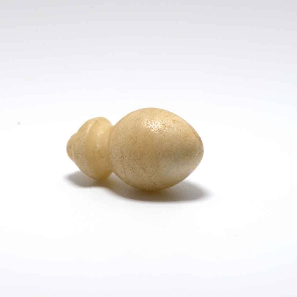 An Egyptian Alabaster Funerary Plummet Weight, New Kingdom, ca. 1550 - 1069 BCE
