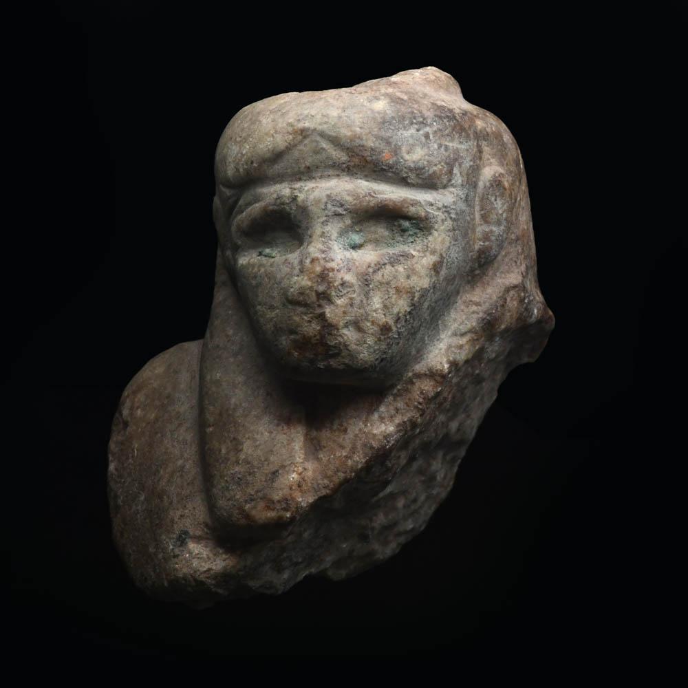 An Egyptian Stone Bust, Late Period, ca. 664 - 332 BCE