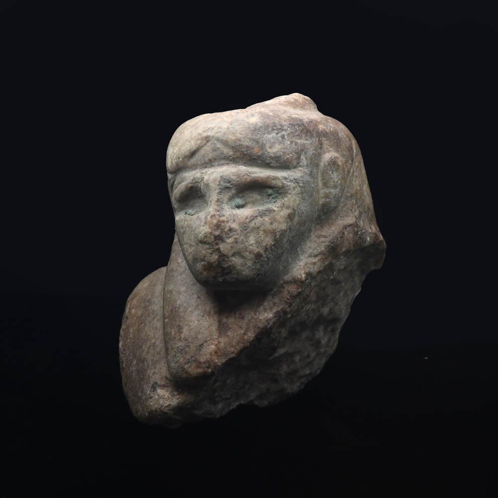 An Egyptian Stone Bust, Late Period, ca. 664 - 332 BCE
