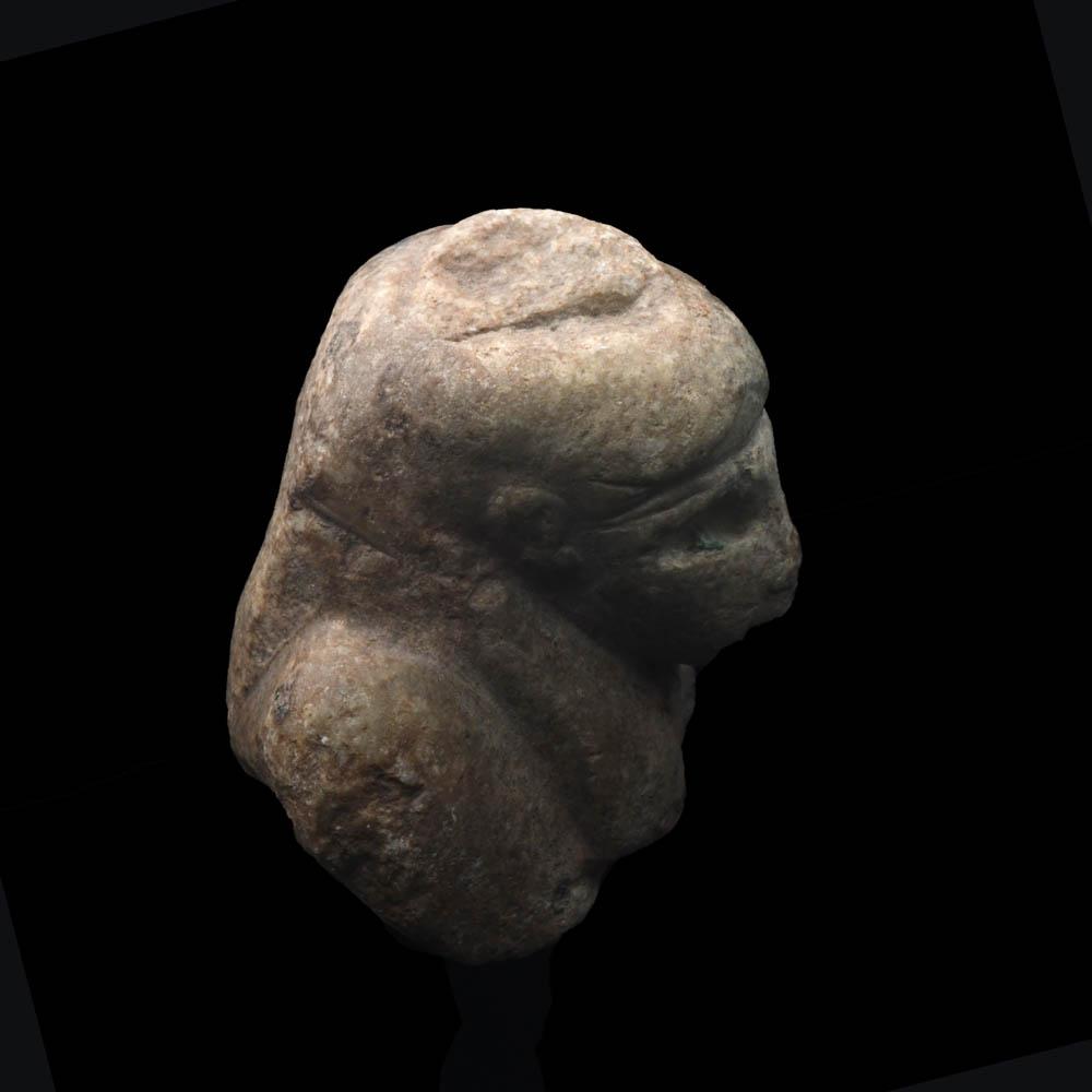 An Egyptian Stone Bust, Late Period, ca. 664 - 332 BCE