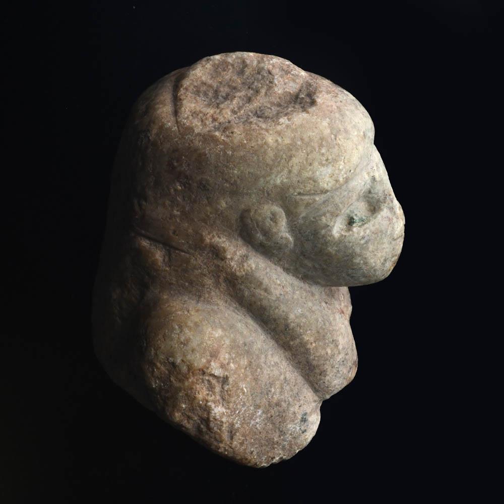 An Egyptian Stone Bust, Late Period, ca. 664 - 332 BCE