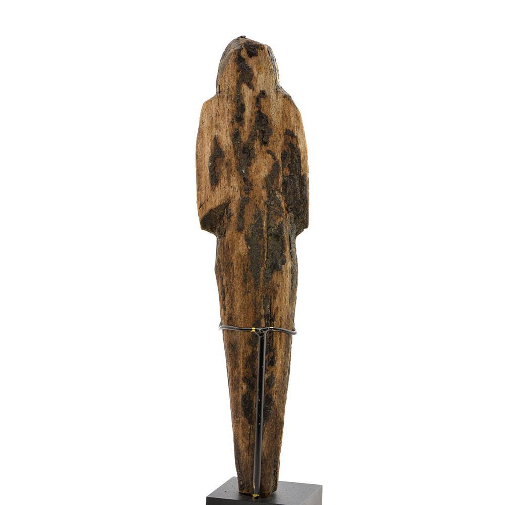 A large Egyptian Wood and Resin Shabti, 20th Dynasty, ca. 1187-1069 BCE