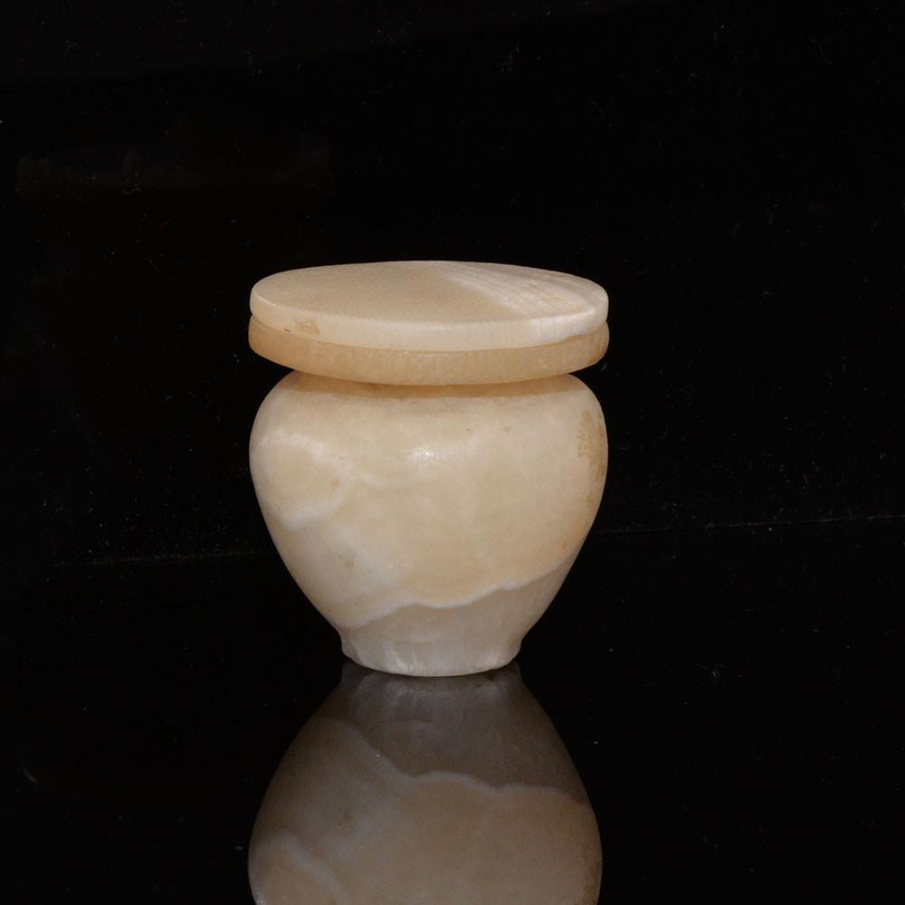 An Egyptian Alabaster Cosmetic Vessel with Lid, Middle Kingdom, ca. 2040-1786 BCE