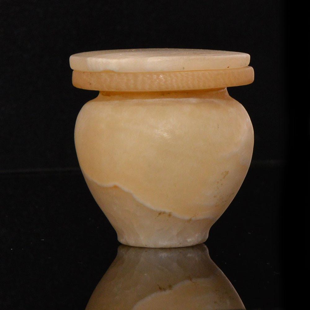 An Egyptian Alabaster Cosmetic Vessel with Lid, Middle Kingdom, ca. 2040-1786 BCE