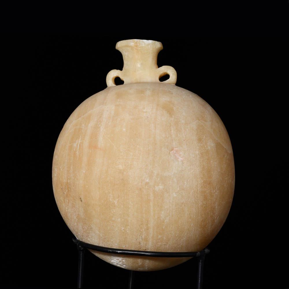 An Egyptian Alabastron with a detachable lid, Late - Ptolemaic Period, ca. 664 - 30 BCE
