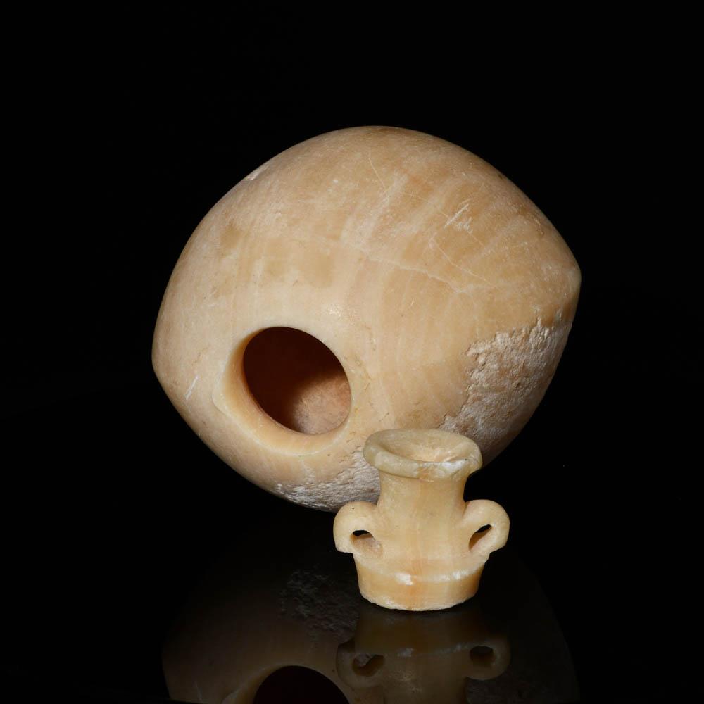 An Egyptian Alabastron with a detachable lid, Late - Ptolemaic Period, ca. 664 - 30 BCE