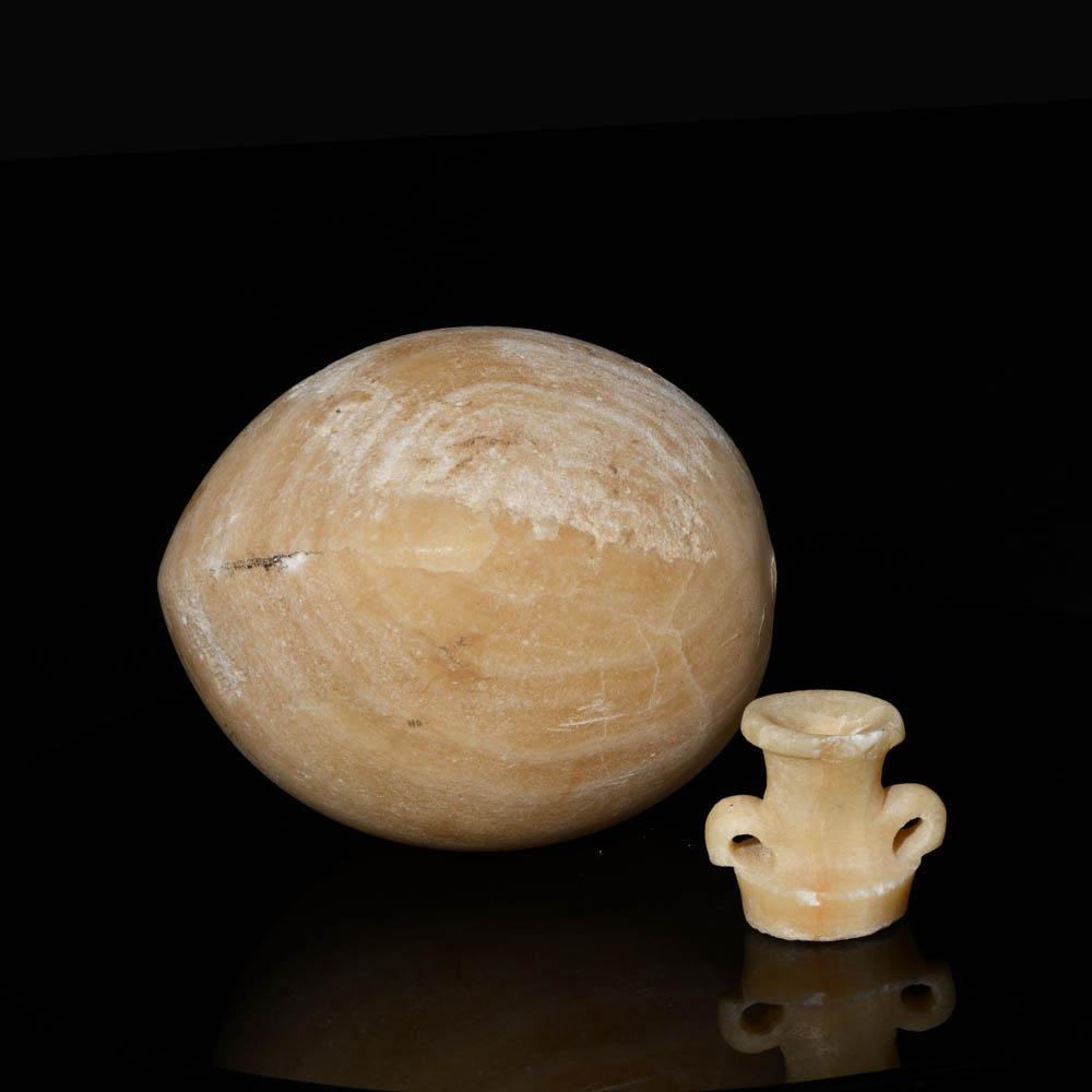 An Egyptian Alabastron with a detachable lid, Late - Ptolemaic Period, ca. 664 - 30 BCE