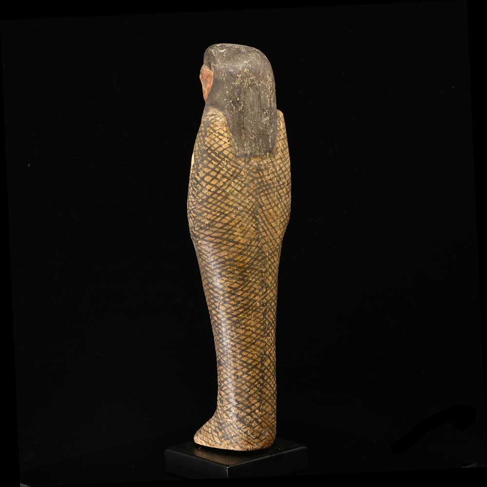 An Egyptian Wood Figure of Imsety, Ptolemaic Period, ca. 332 - 30 BCE