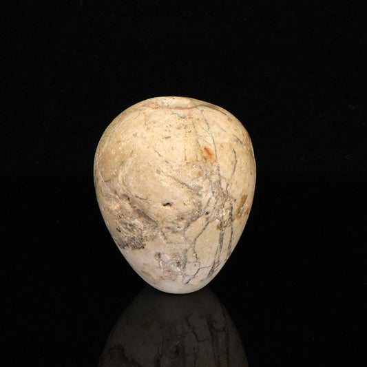 An Egyptian Indurated Limestone Mace Head, Pre-Dynastic Period, ca. 3500 - 3200 BCE