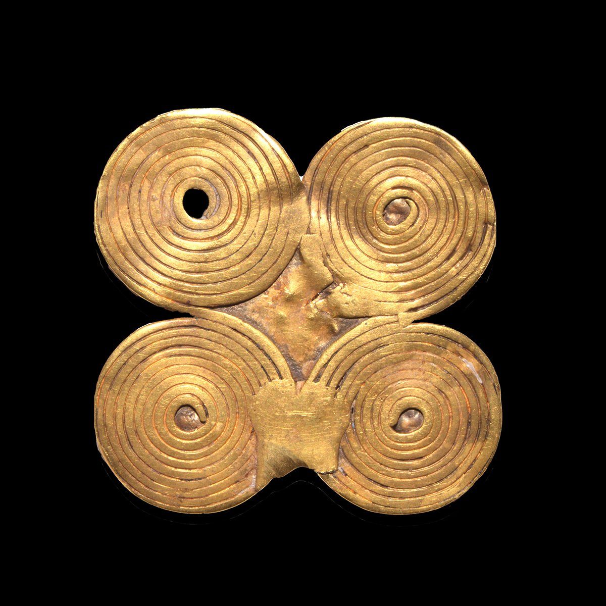 An Etruscan four Leaf Gold Spiral Fibula, ca. 800 - 700 BCE