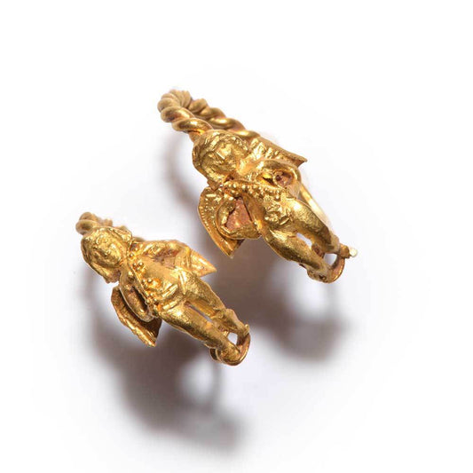 A fine pair of gold figural Eros earrings, Hellenistic Period, ca. 4th - 3rd Century BCE